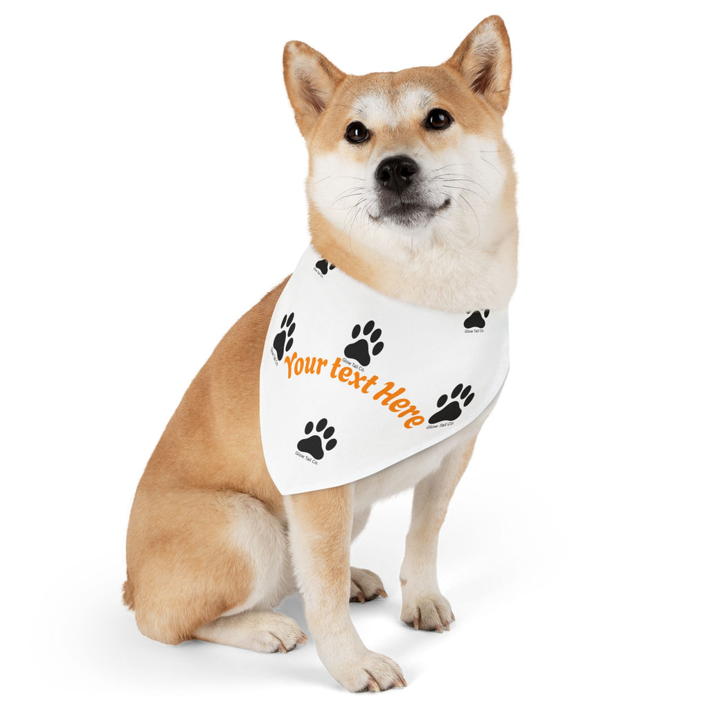 Dog wearing a customizable bandana with text and paw prints on a white background