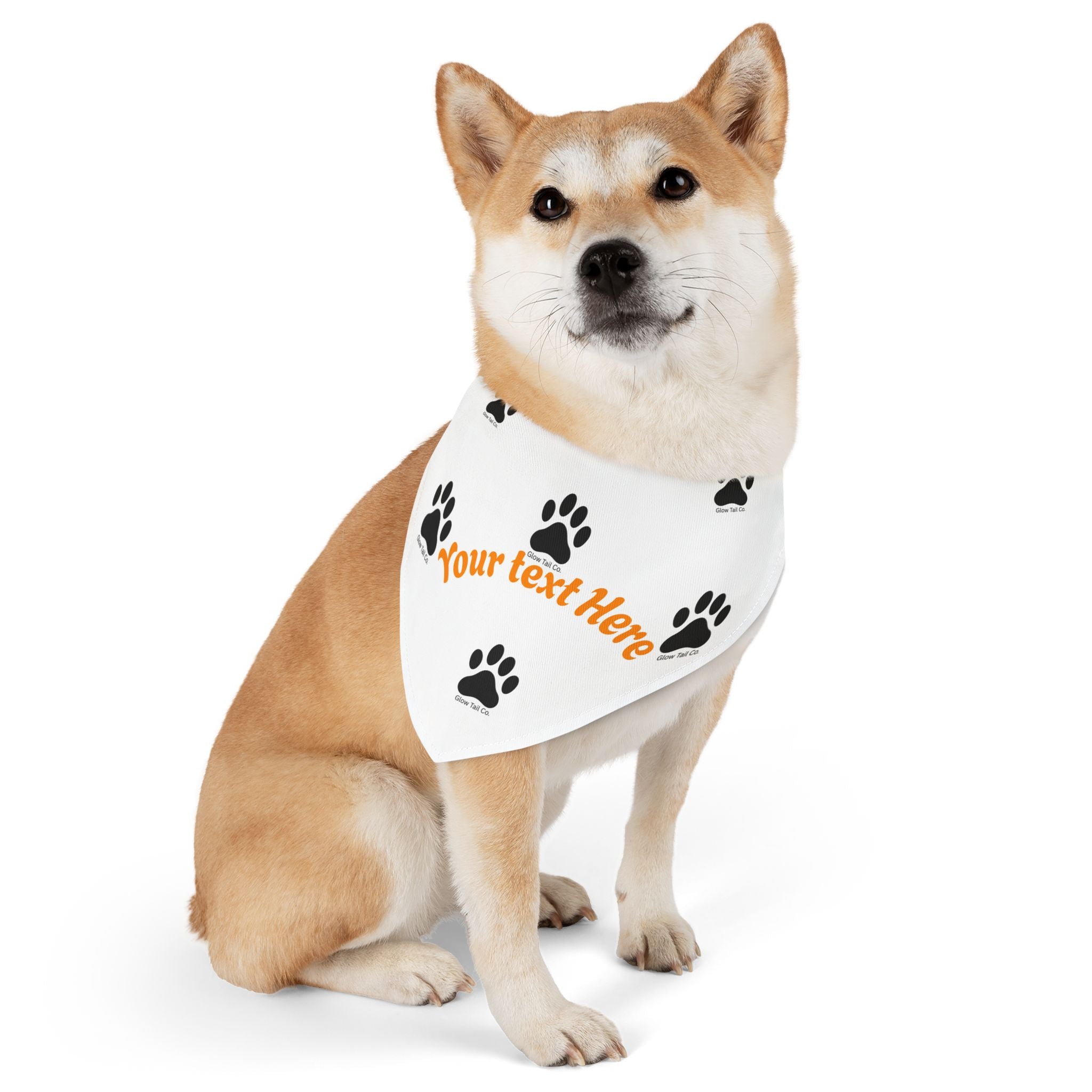 Dog wearing a customizable bandana with text and paw prints on a white background